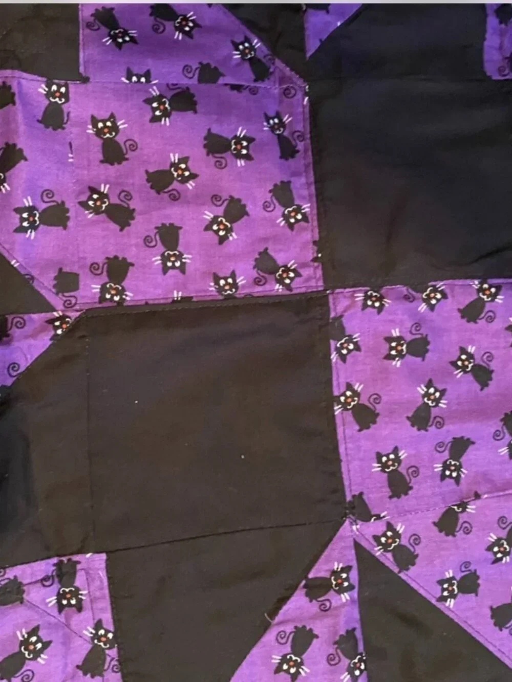 2 Fabric baskets, black cats, and Halloween placemat centerpiece